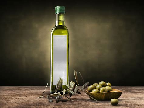 Download Wooden Spoon With Olive Oil and Olive